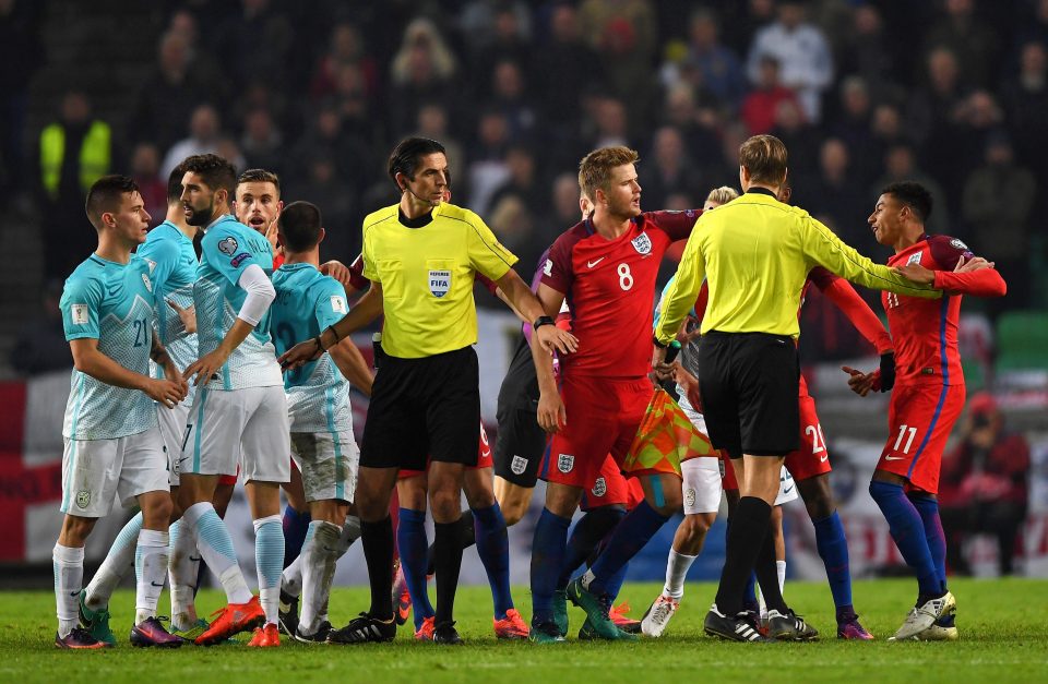  Jesse Lingard was booked after a heated exchange with Slovakian players