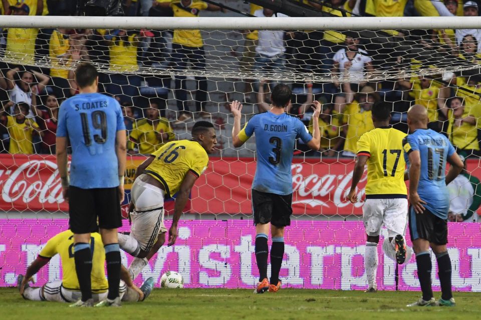  Yerry Mina reels away after rescuing point for Colombia at home to Uruguay