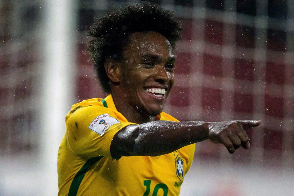  Willian celebrates after scoring Brazil's second goal in victory over Venezuela