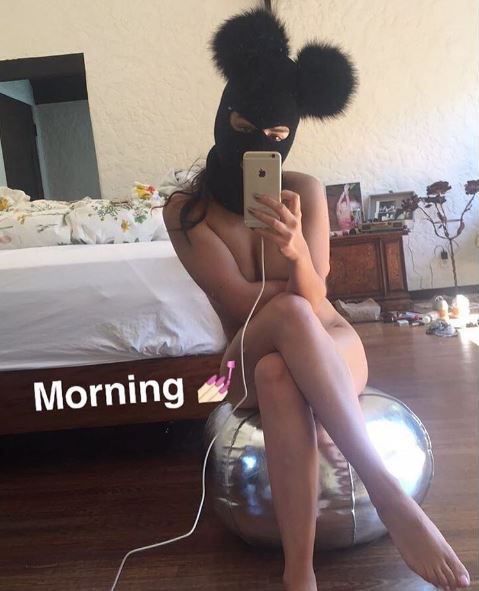  Charlie XCX shocked fans by posing naked with nothing but a balaclava