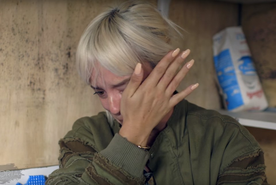  Teary me . . . She cries in a BBC interview with a young refugee while at the Calais jungle