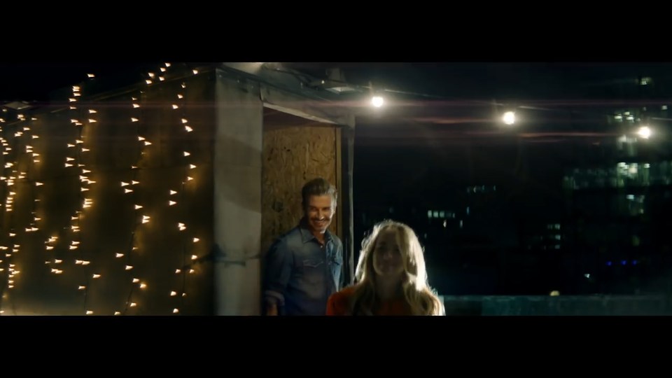  David Beckham walks past an attractive woman in one of the scenes from the advert