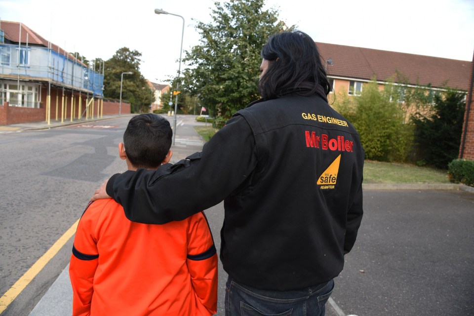  The young boy was walking home from school when he was targeted by the gang of three