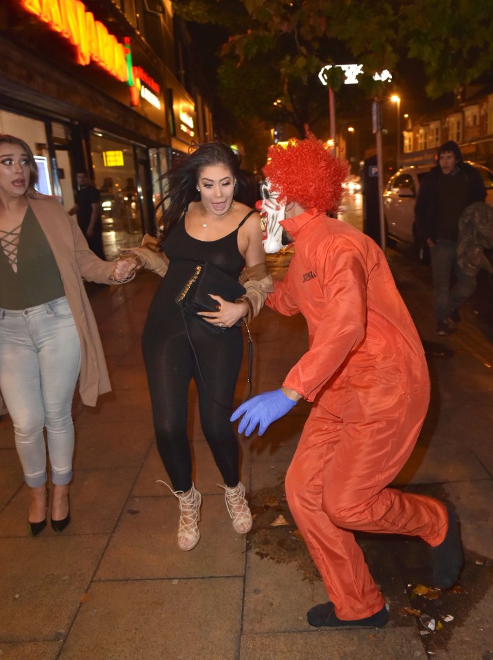  Chloe and her pal were left terrified when a 'killer clown' jumped out and grabbed them