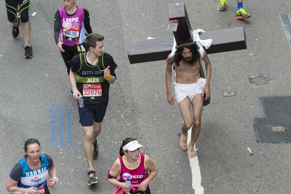  This barefoot runner dressed a Jesus did not make it easy for himself shouldering a huge cross, while most carried nothing heavier than a charity-branded t-shirt