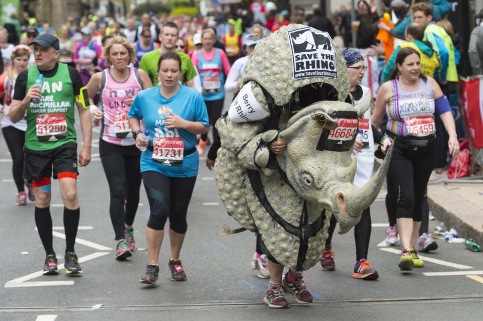  A runner dressed as a rhino tackles last year's London Marathon to raise money for wildlife conservation