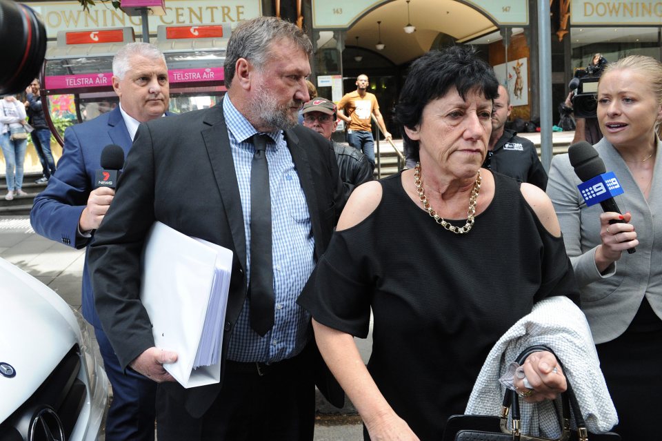  The family of Phil Hughes leave the inquest into his death