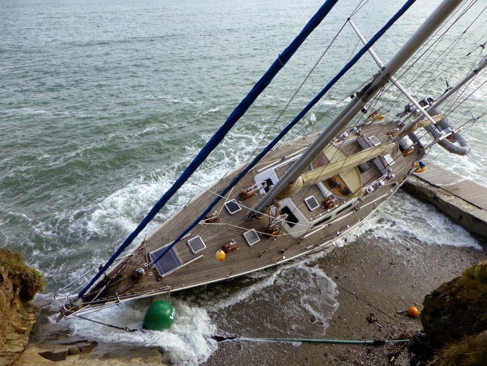  The luxury yacht washed up on the beach at Trebah Bay, Cornwall, after breaking free of its moorings