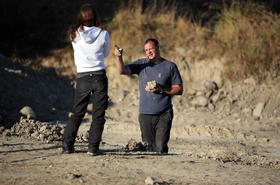  Police officers and forensic specialists continue to search sites on the Greek island of Kos