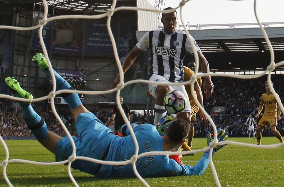 Hugo Lloris in action with West Bromwich Albion's Salomon Rondon