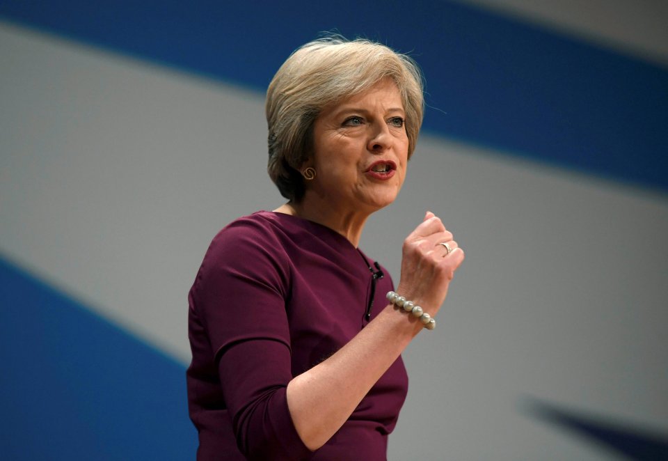 Britain's Prime Minister Theresa May gives her speech on the final day of the annual Conservative Party Conference in Birmingham