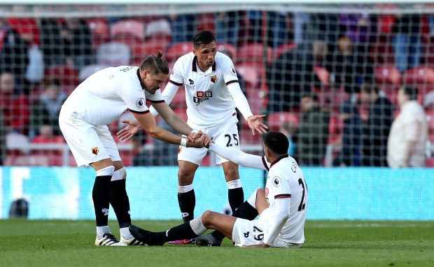 Jose Holebas and Etienne Capoue argue on the pitch despite 1-0 win at Middlesbrough