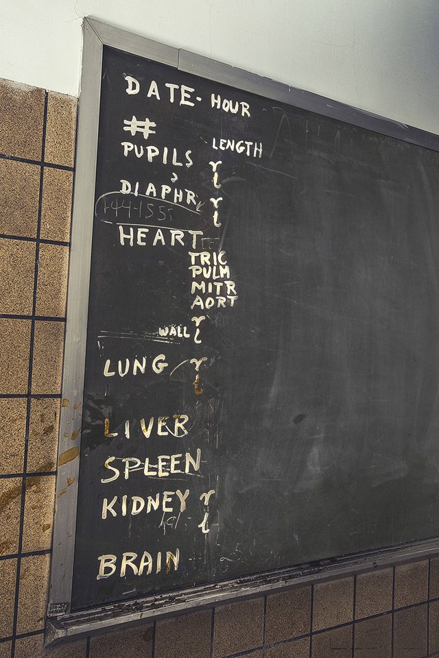  Pathologist labs were also amongst the places snapped. Here a chalkboard displays a log of the grisly work undertaken nearby