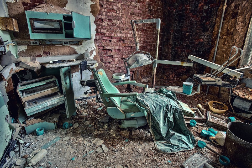  A dental unit at a former children's ward lies abandoned and destroyed by time