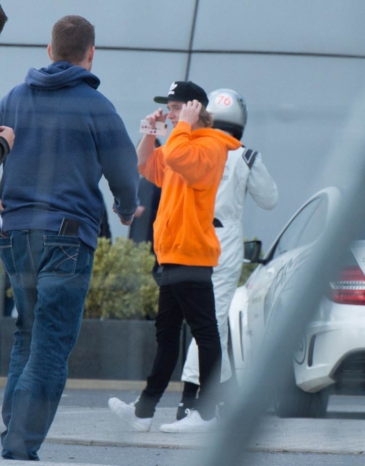 The teen kept his ever growing hair out of his face with a baseball cap