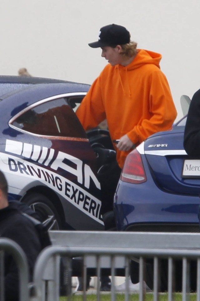 The teenager wore a bright orange hoodie for the outing