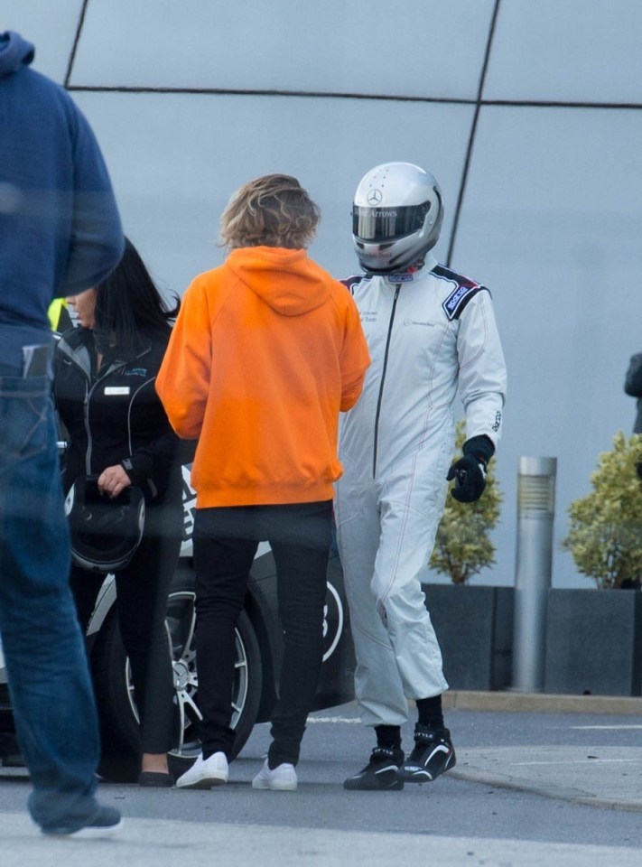 Brooklyn chatted to a guy who resembled The Stig from Top Gear at one point