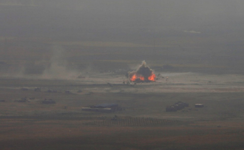 A car bomb attack is seen in the east of Mosul during clashes with Islamic State militants