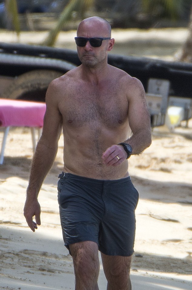  The former England striker was spotted enjoying a day at the beach while on holiday in Bridgetown