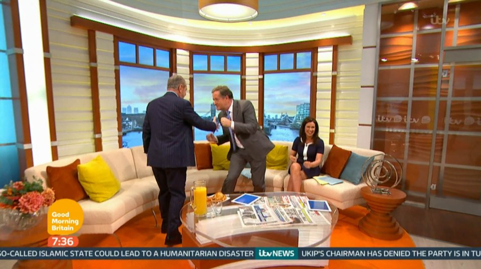  At the beginning of his interview, Lord Sugar literally squared up to Piers as he walked onto the set as the host shunned a handshake and raised his fists in a mock fight pose