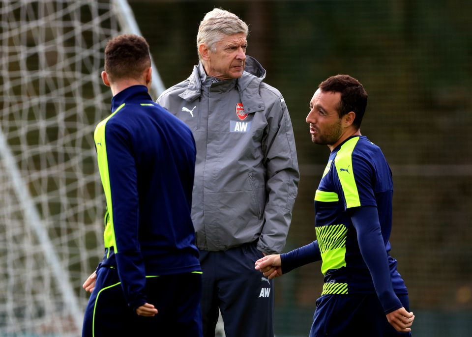  Cazorla and Arsene Wenger in training