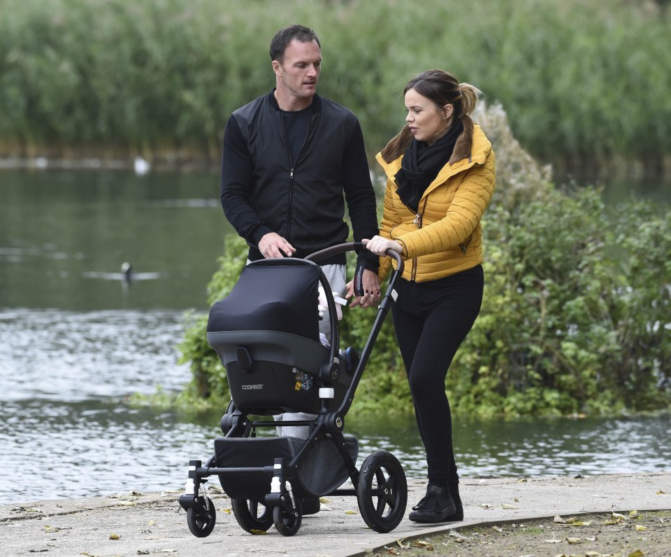 Maria Fowler and partner Kelvin Batey take daughter Evie for a stroll in the park