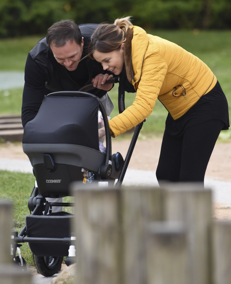 The couple couldn't keep their eyes off their baby girl...