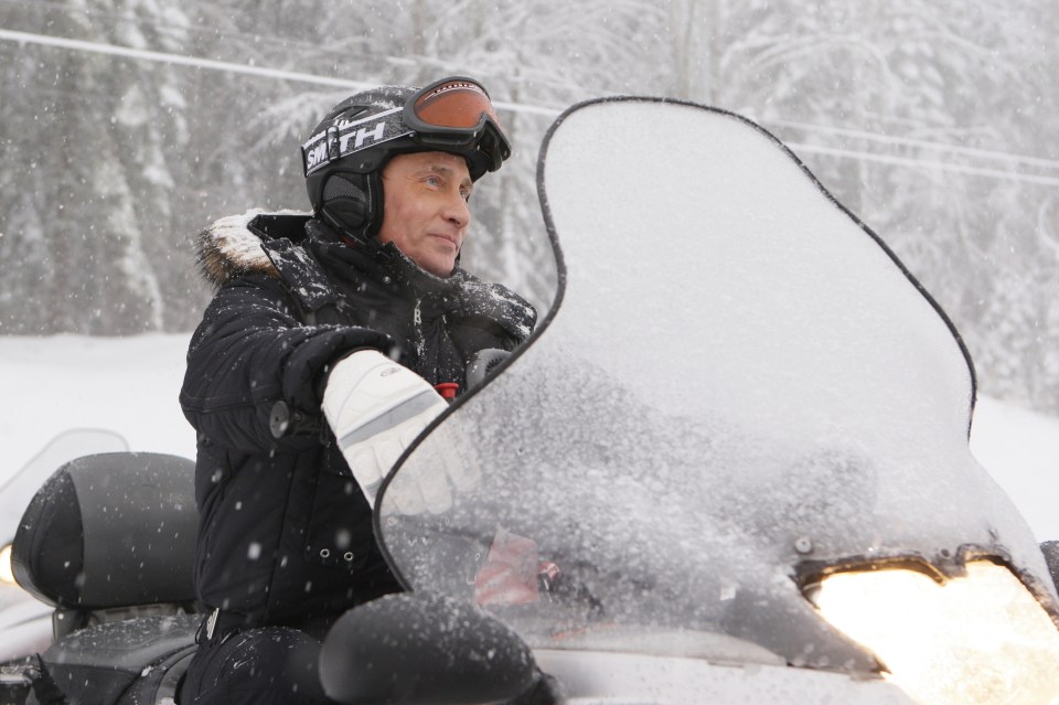  Here he is seen riding a snowmobile in the ski resort of Sochi