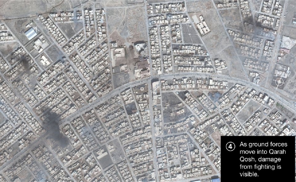  Fighting in the nearby village of Qarah Qosh is seen in this aerial satellite image