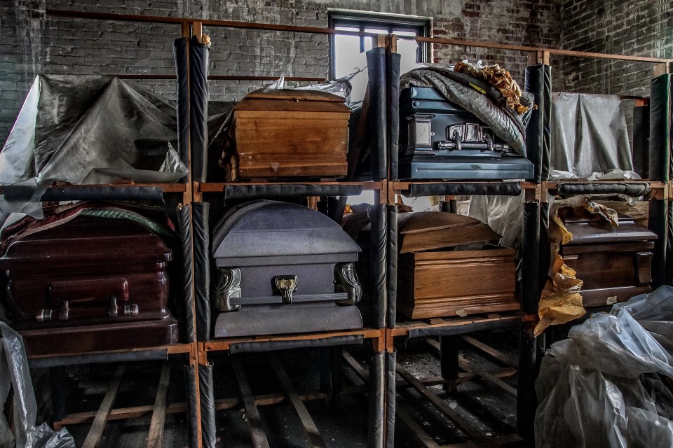  Caskets lie abandoned in the abandoned Florida funeral home