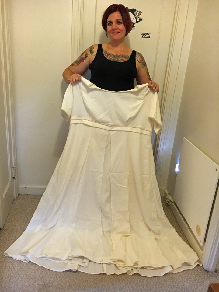  Beckah's wedding dress looks almost twice the size of her