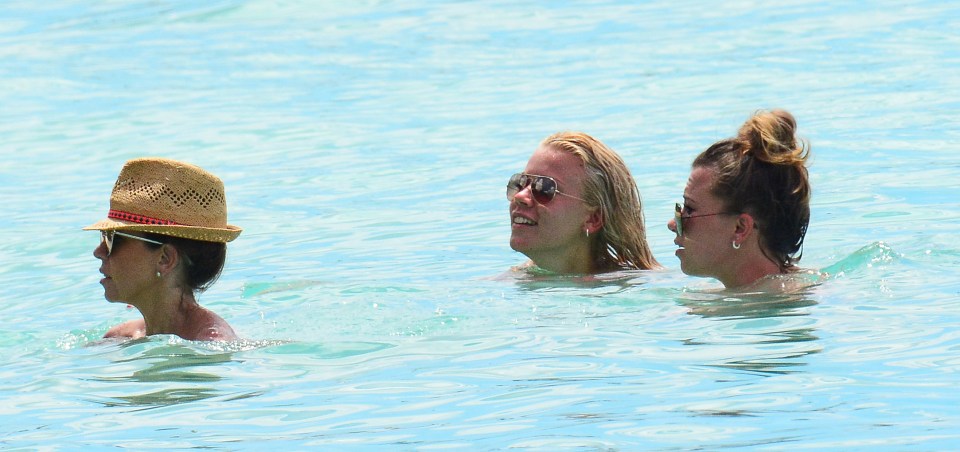  The Shearer family take a relaxing dip while enjoying their Barbados holiday