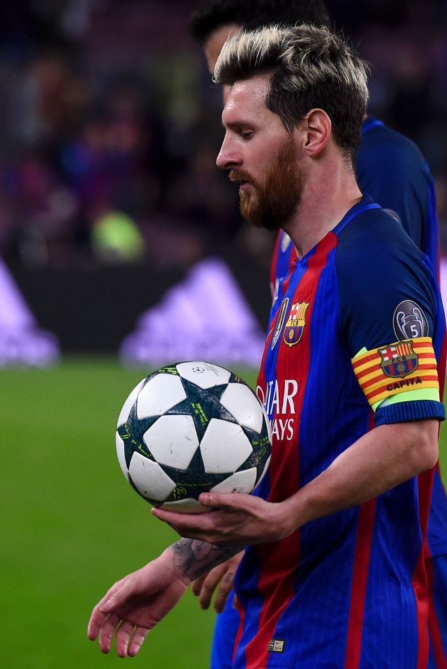  The Barcelona star with the match ball after his hat-trick against City in the Nou Camp