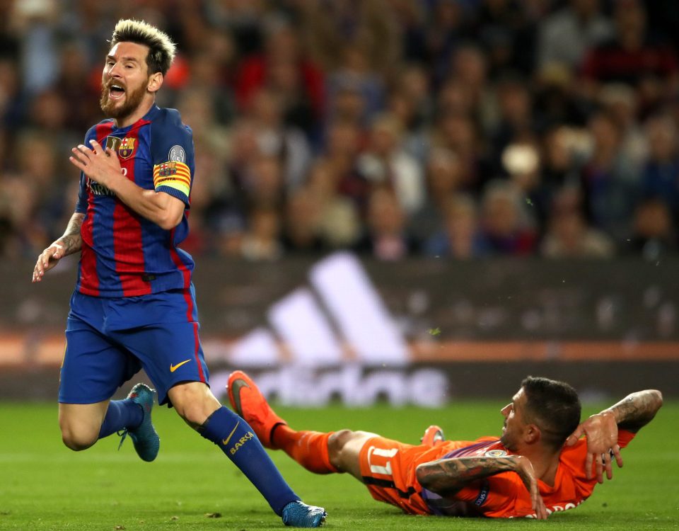  Hat-trick scorer Lionel Messi wins a penalty - missed by Neymar with this foul from Manchester City defender Aleksandar Kolarov