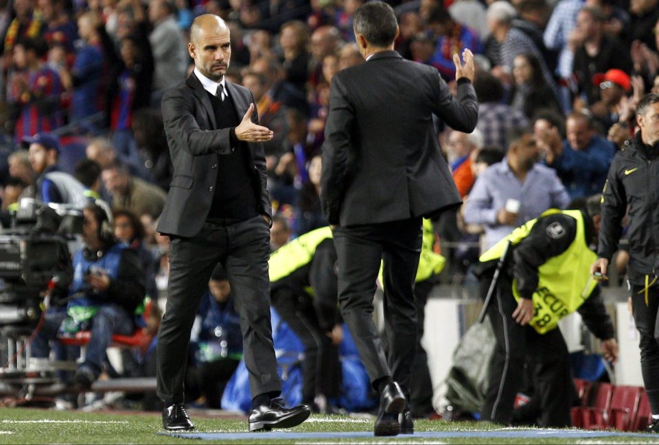  Guardiola congratulates Barcelona coach Luis Enrique after Man City slumped to a deceptive 4-0 defeat in this Champions League group game