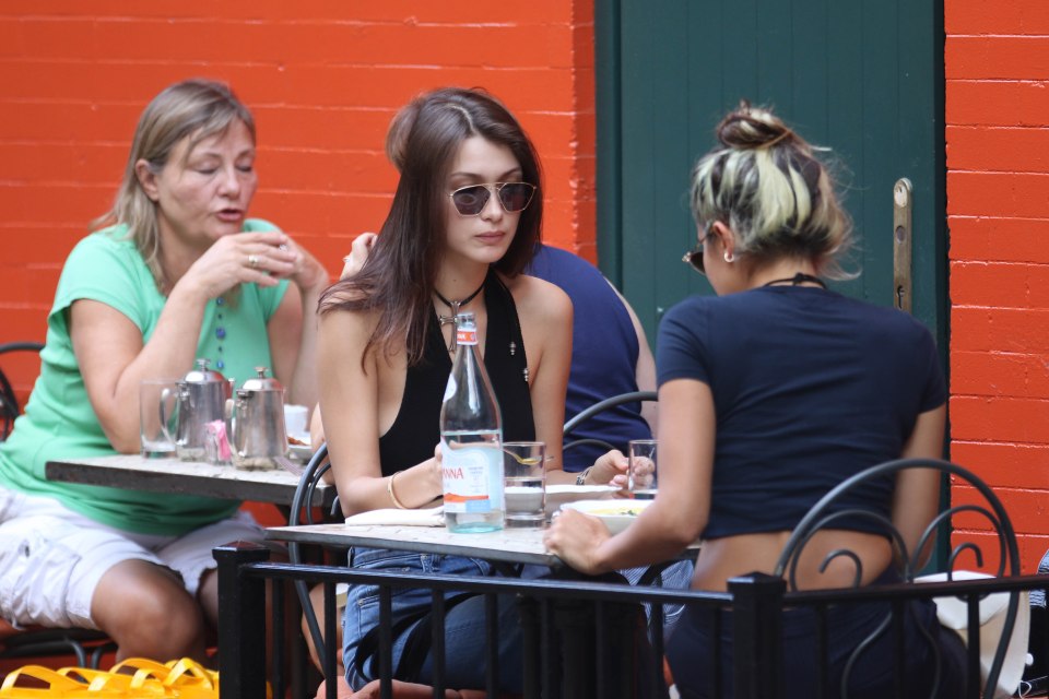  Bella sat down for a bite to eat with a pal