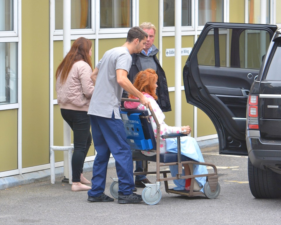  Harry was seen escorting Sandra into his Range Rover outside of the hospital this morning