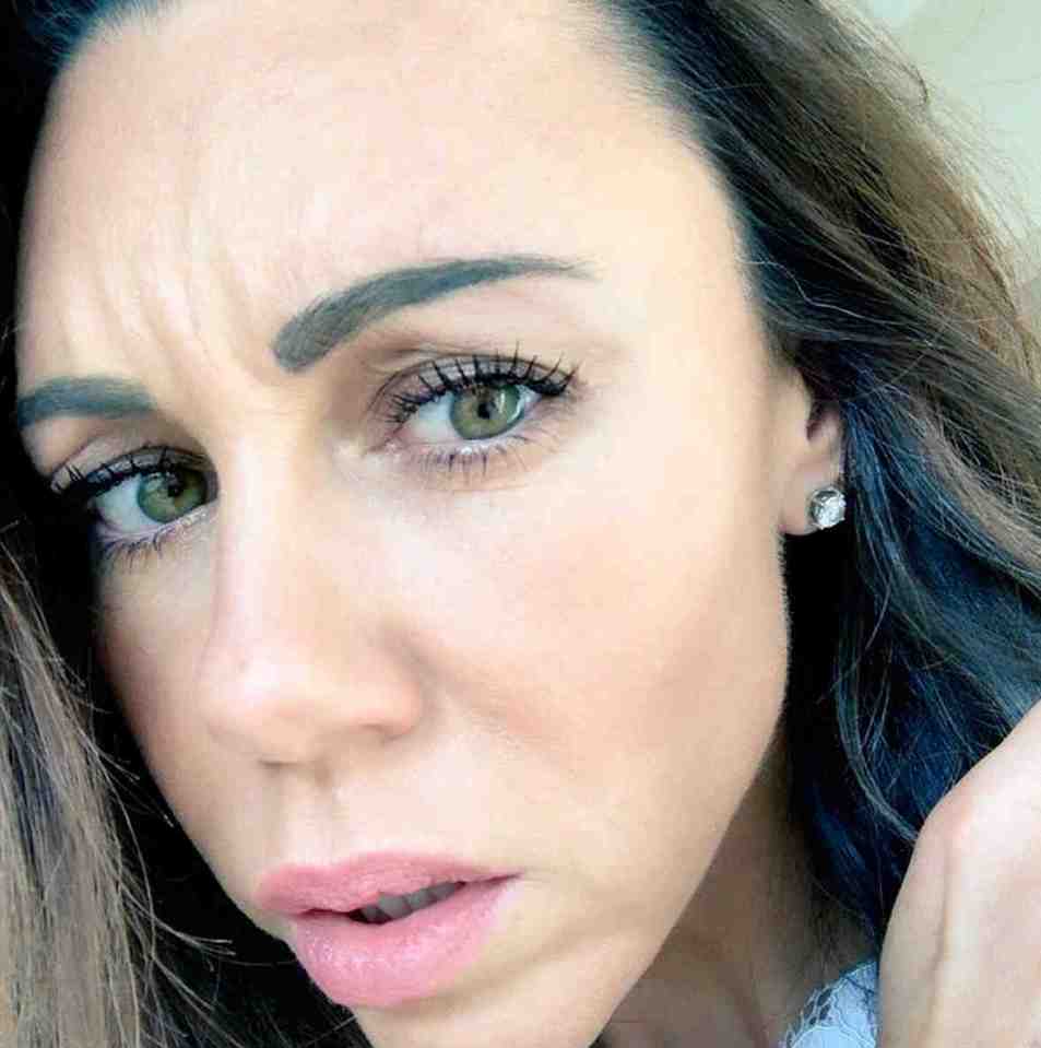  Michelle Heaton looked distressed as she found her first grey hair