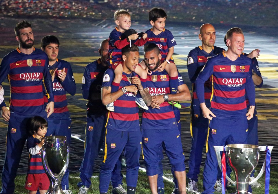  Douglas celebrates winning the Copa del Rey with Neymar, Gerard Pique and Marc-Andre ter Stegen