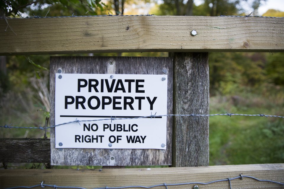 Henry used barbed wire and this uninviting sign