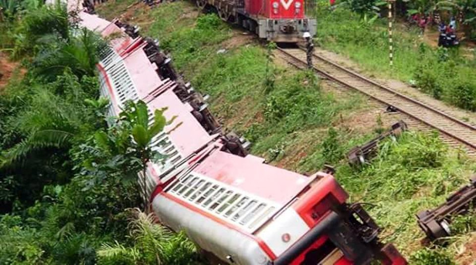  Several carriages swung off the track as the train derailed leaving debris strewn across the adjacent tracks