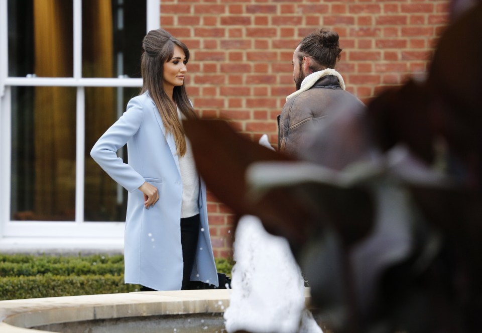 The pair stood outside to chat as they prepared for their make-or-break time away 