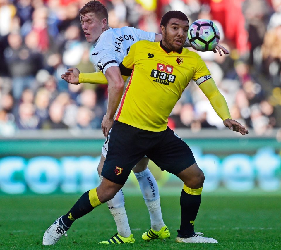  Alfie Mawson struggles to contain Watford striker Troy Deeney, who some are tipping for England