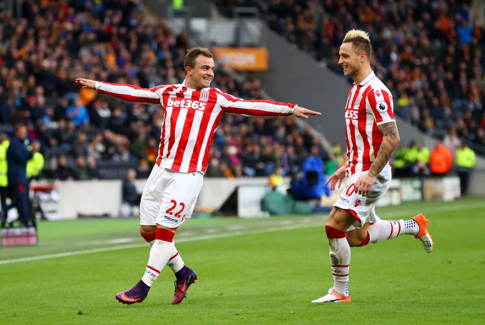  Shaqiri is congratulated by teammate Marko Arnautovic