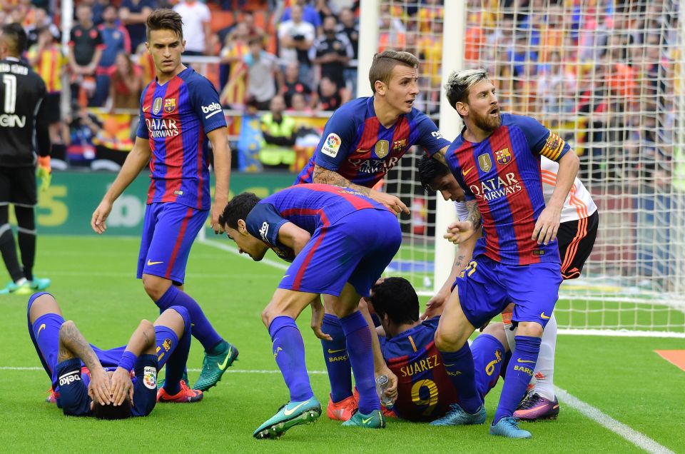  As Barcelona's players celebrated in front of rival fans, a bottle was thrown that hit Neymar and Suarez