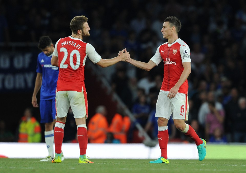  Shkrodan Mustafi and Laurent Koscielny are Arsenal stars