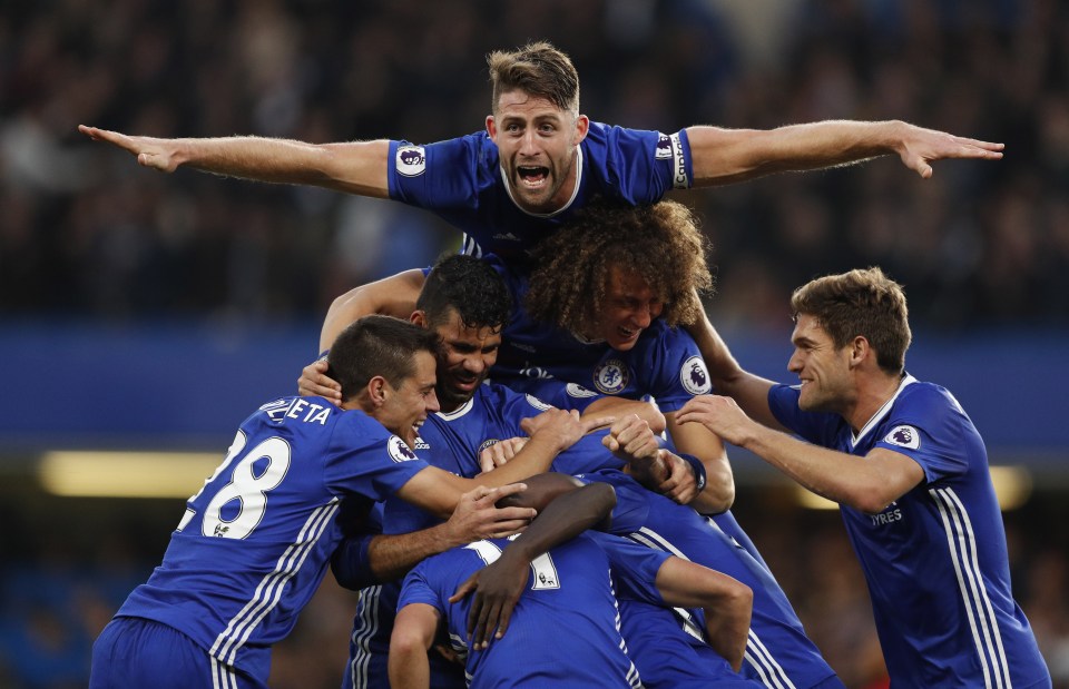  Chelsea players celebrate as they hammer Manchester United at Stamford Bridge