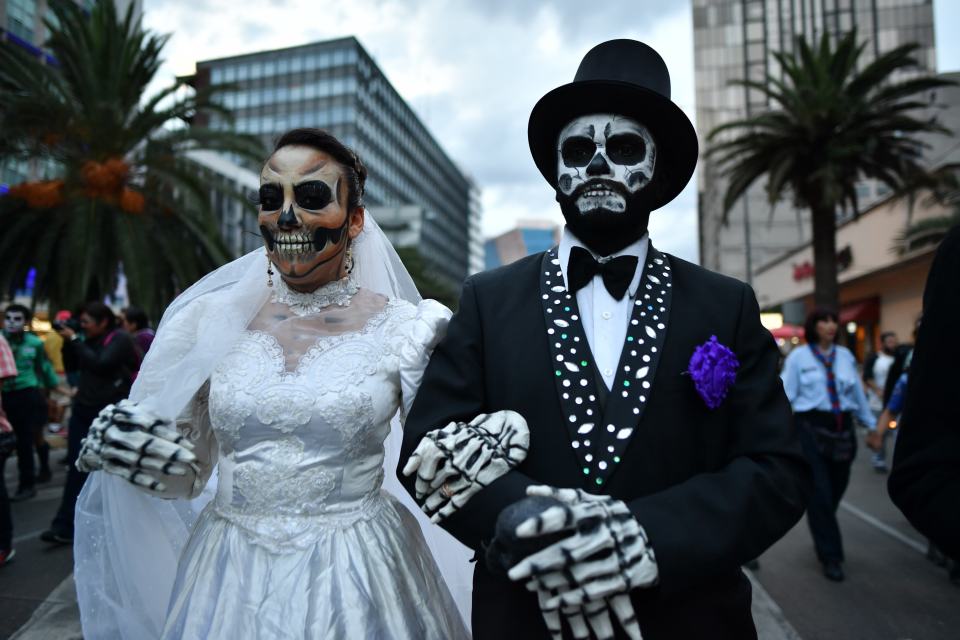  The altars are usually adorned with traditional sugar skulls, flowers, and the deceased person's favourite foods and drinks