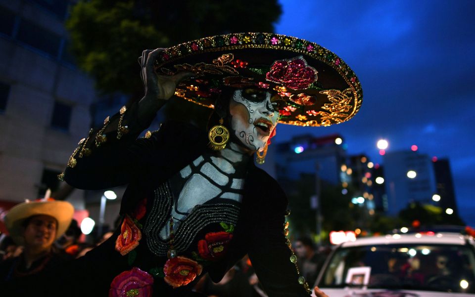  But unlike Halloween, Day of the Dead is not about being scared of the supernatural - but rather celebrating the spirits of loved ones