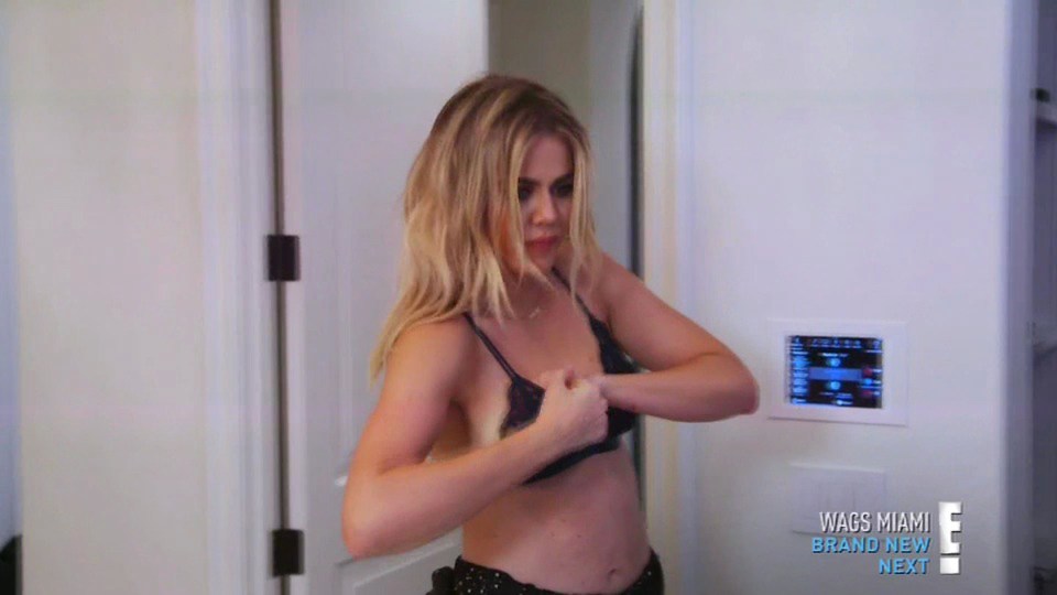  Khloe tries out different kinds of padding as she discusses the idea of surgery with Kim